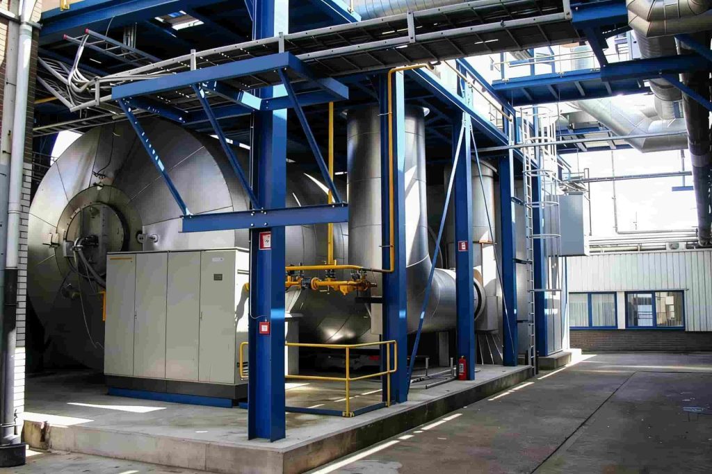 Biomass burner retrofit installed on paper mill steam boiler for natural gas cost reduction